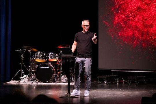 Pastor Dennis preaching