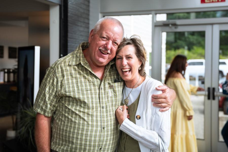 Legacy 60 friends laughing together