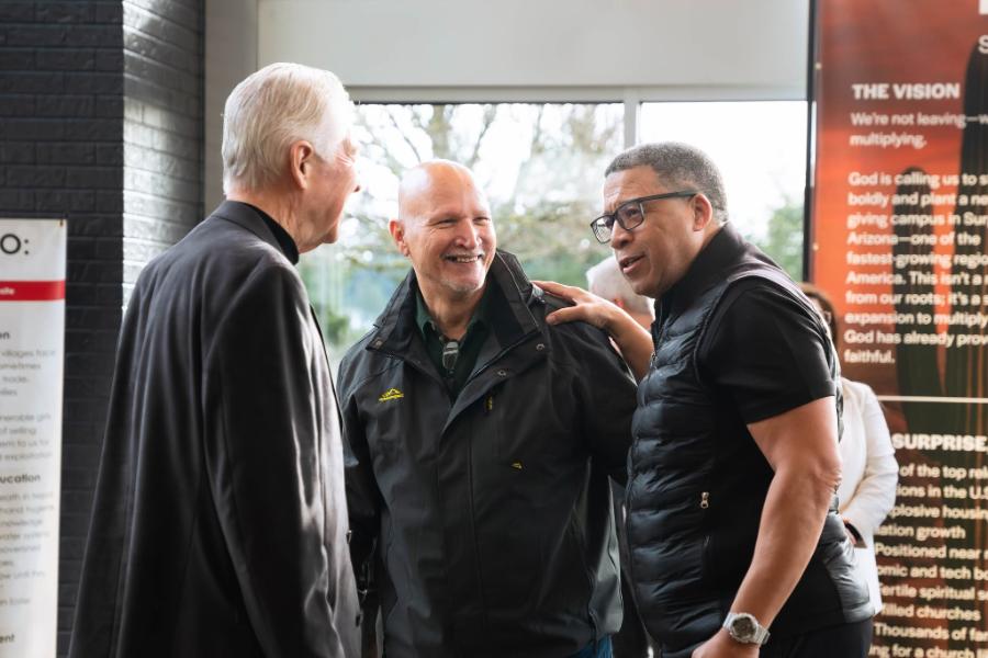 Friends catching up in the lobby