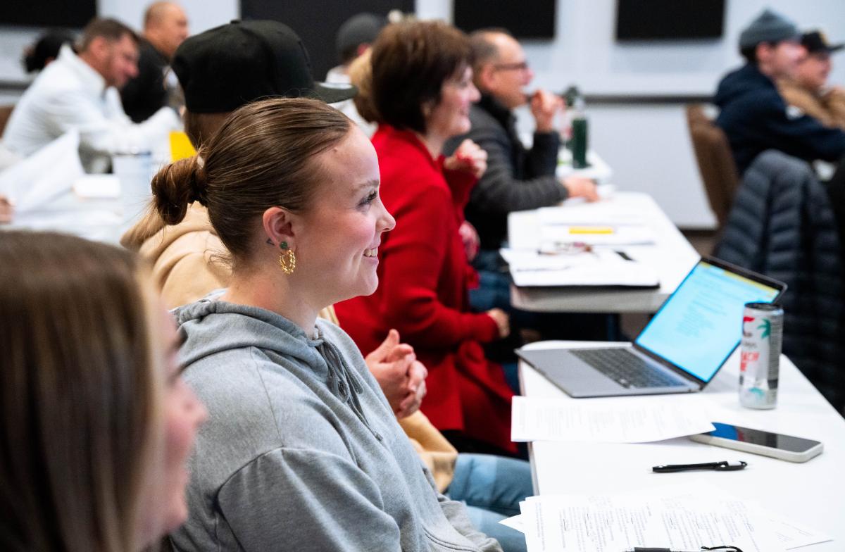 Students listening during a School of Leadership class